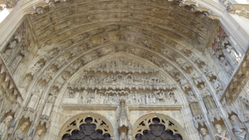 Intricate and very old sculptures above the front door of the Dom in Augsburg